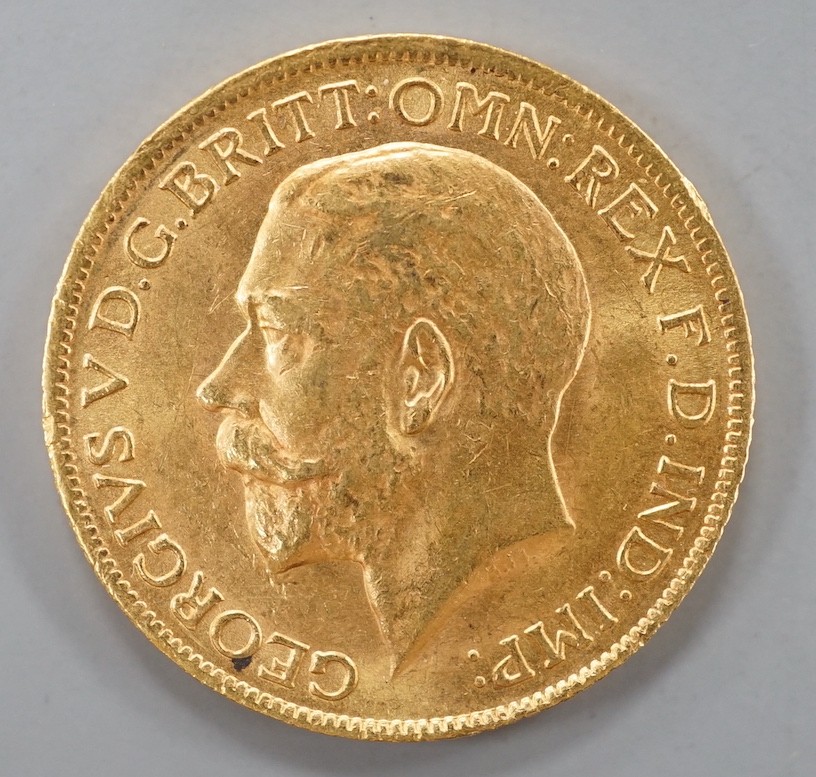 A George V 1913 gold sovereign.